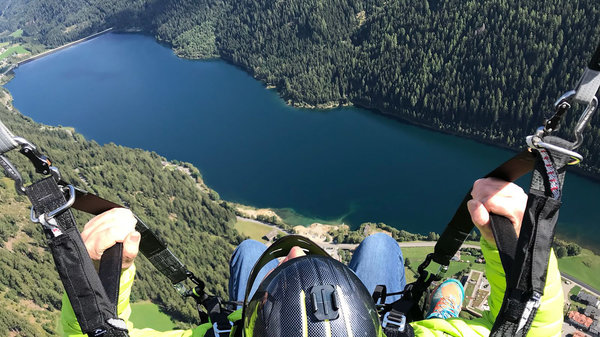 Paragliding in Ultental Valley from 2,150m above sea level from the Schwemmalm hiking area with a beautiful view on the Zoggler lake..
