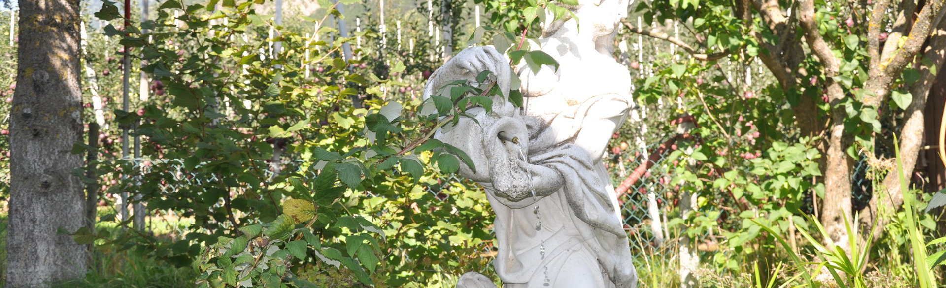 Greek statue in the garden of Pension Feldgärtenhof
